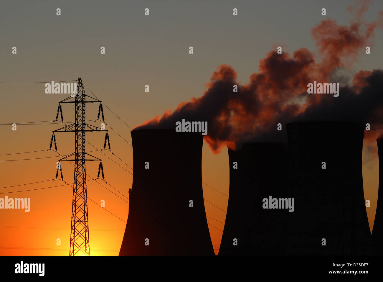 power plant and high voltage tower during sunset Stock Photo - Alamy