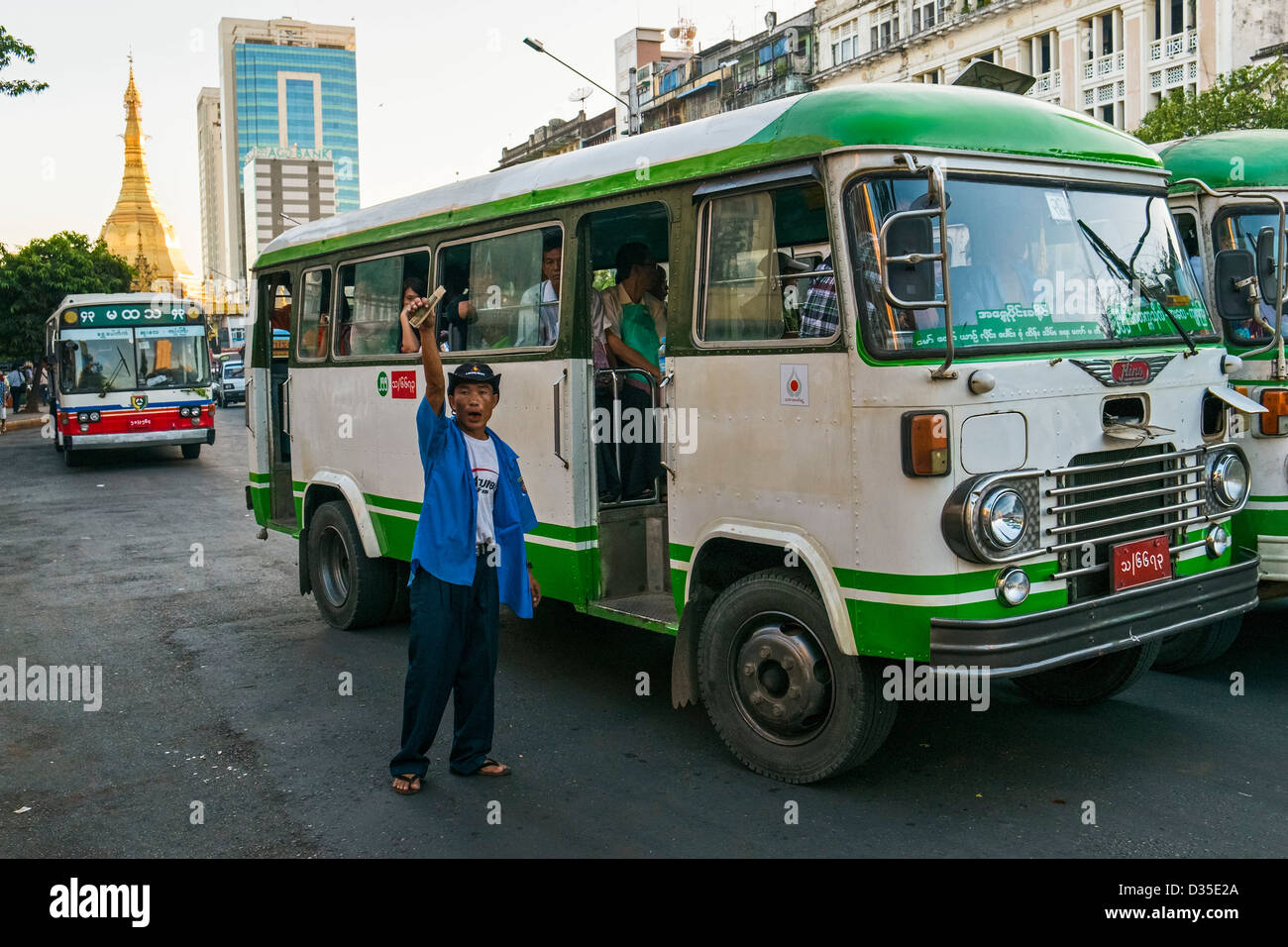 Bus station in front of Sule Pagoda, Yangon, Myanmar, Asia Stock Photo