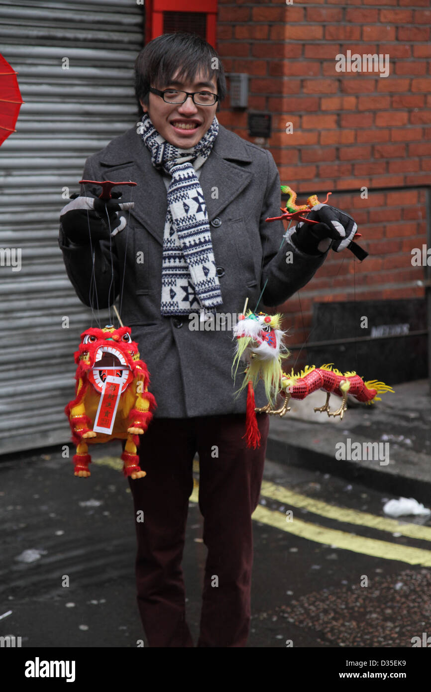 Chinese vendor selling dragon ornaments hi-res stock photography and ...