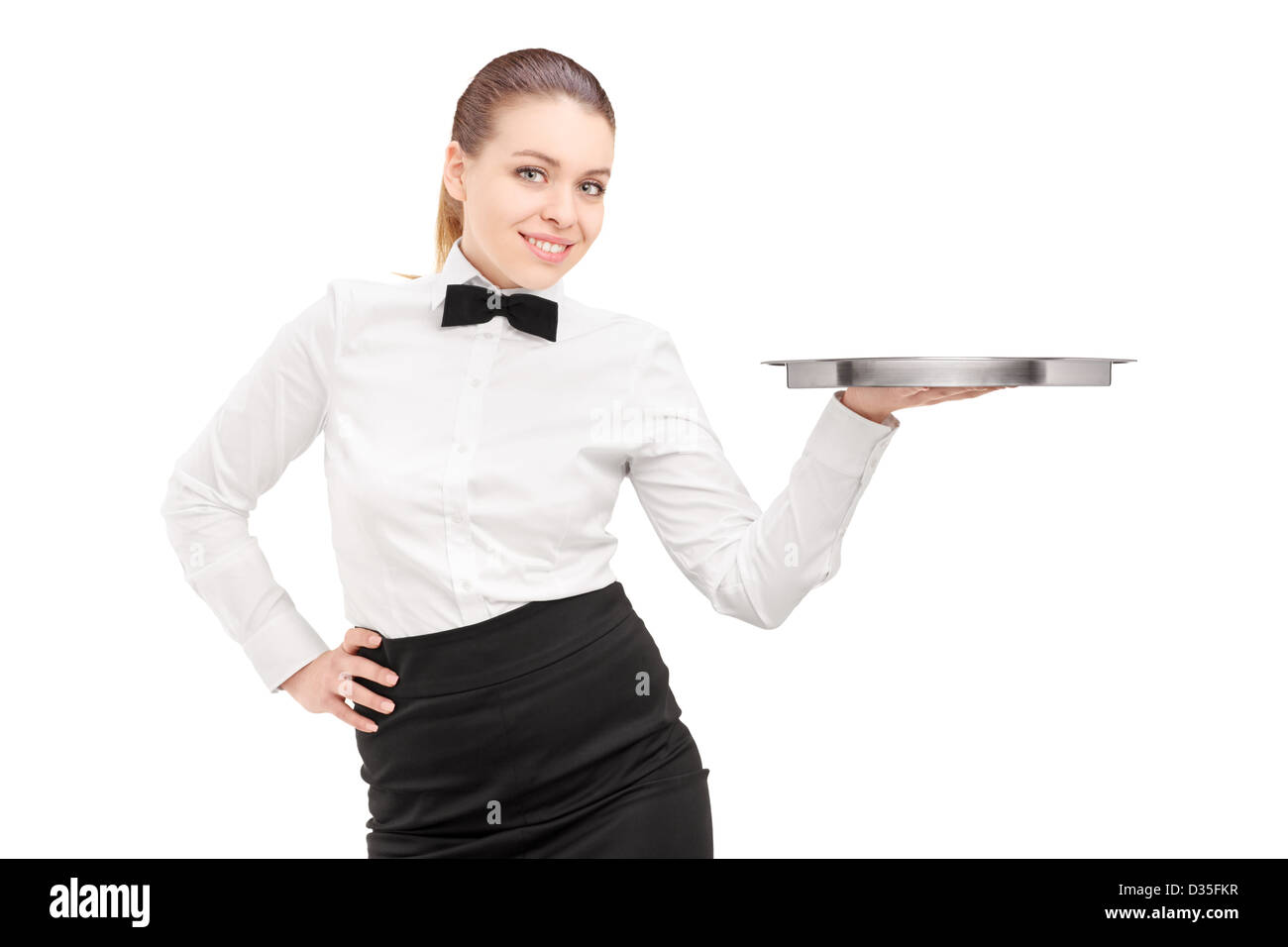 A waitress with bow tie holding