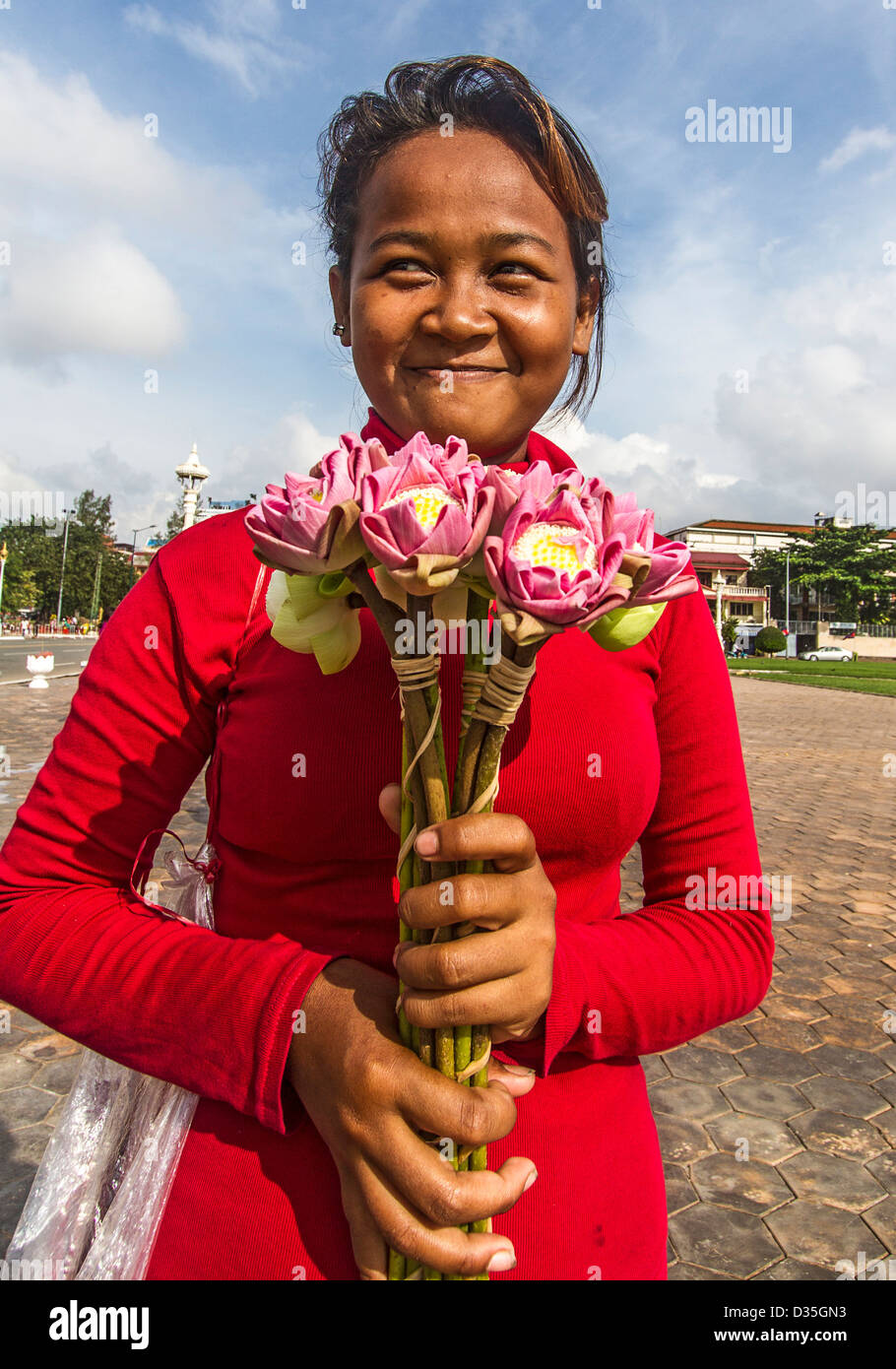 Young woman selling lotus flowers outside the Royal Palace, Phnom Penh, Cambodia Stock Photo Alamy