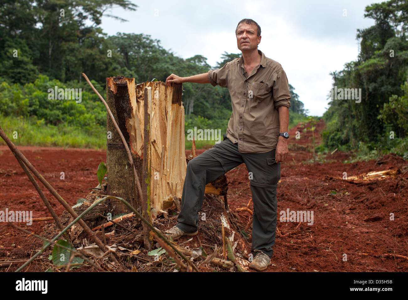 CONGO, 27th Sept 2012: Pauwel De Wachter, WWF Central Africa Tridom Coordinator, stands on the new road Chinese road engineers are building. Stock Photo