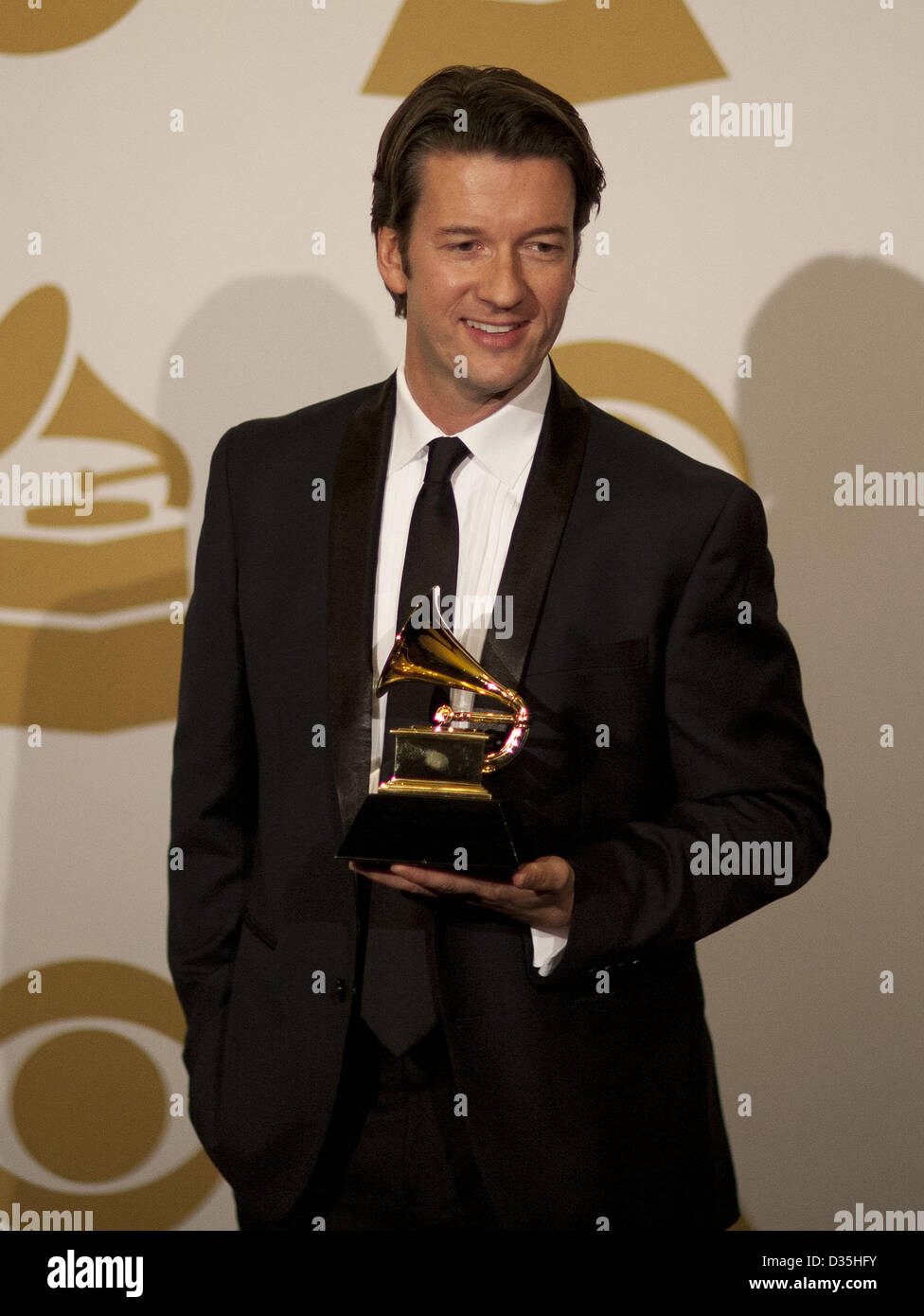 Feb. 10, 2013 - Los Angelles, California, USA - Fritz Klackte, art director Woody At 100: The Woody Guthrie Centennial Collection receives Grammy for Best Boxed or Special Limited Edition Package at the 55th Annual Grammy Awards press room at Staples Center in Los Angeles, California on Sunday February 10, 2013. (Credit Image: © Armando Arorizo/Prensa Internacional/ZUMAPRESS.com) Stock Photo