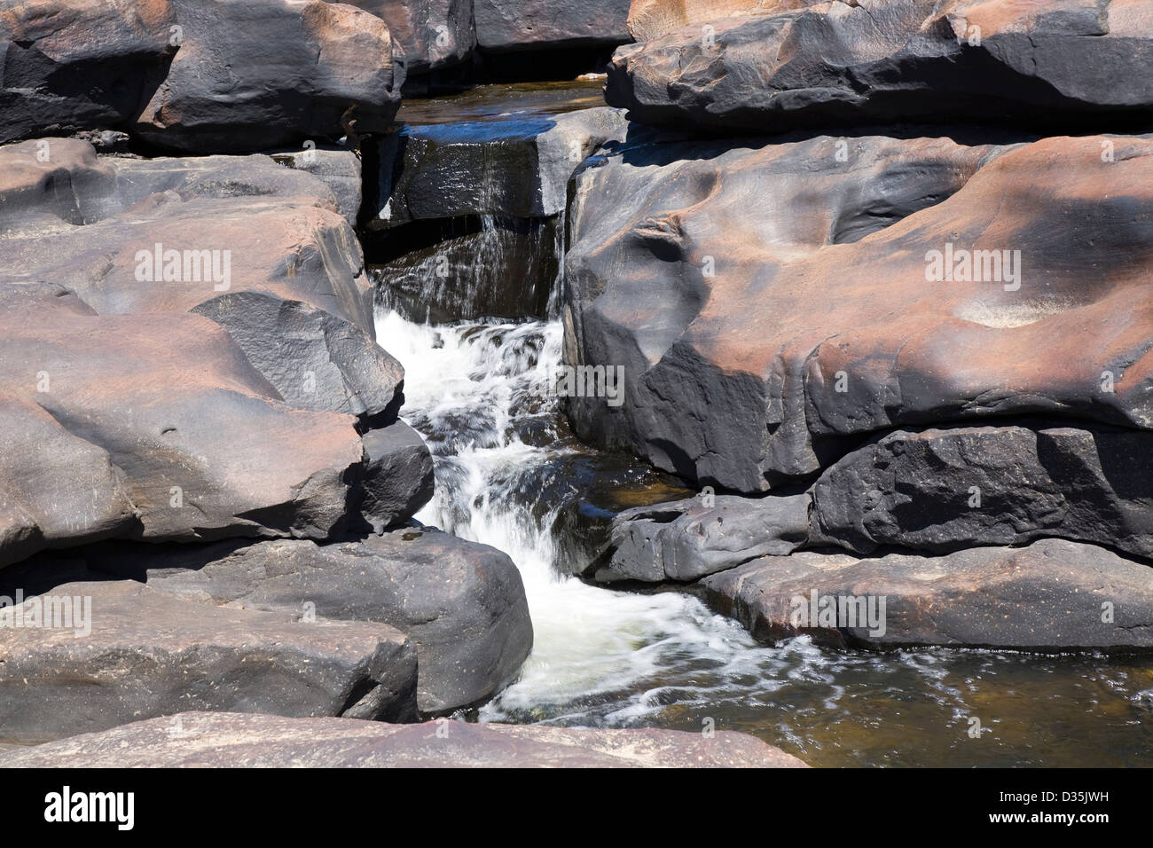 The King George River tumbles over sandstone boulders on its way to King George Falls, Kimberley region, Western Australia Stock Photo