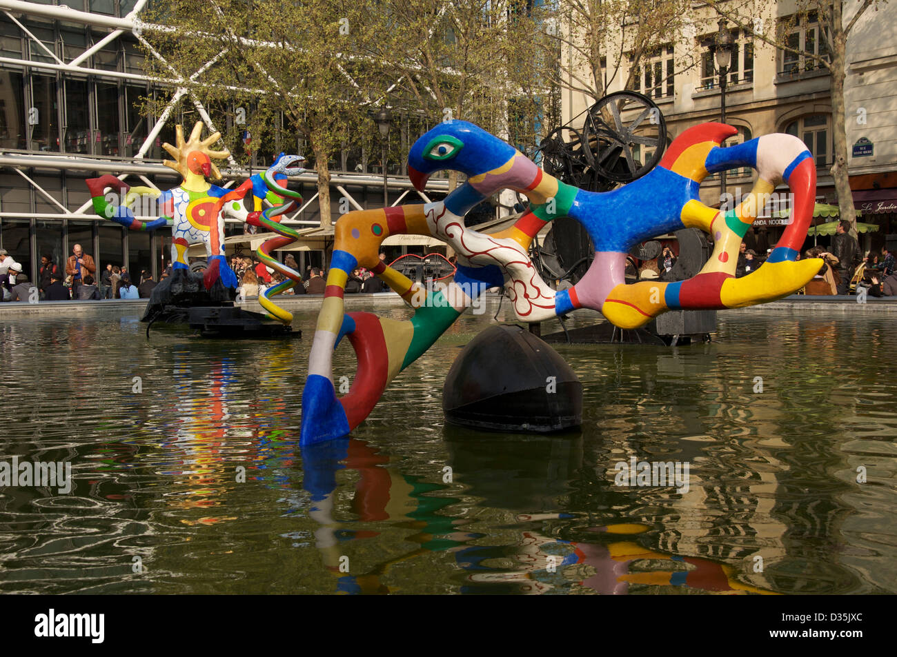 The quirky colourful and surreal sculptures of artists Jean Tinguely and Niki de Saint Phalle which make up the Stravinsky fountain in Paris. France. Stock Photo