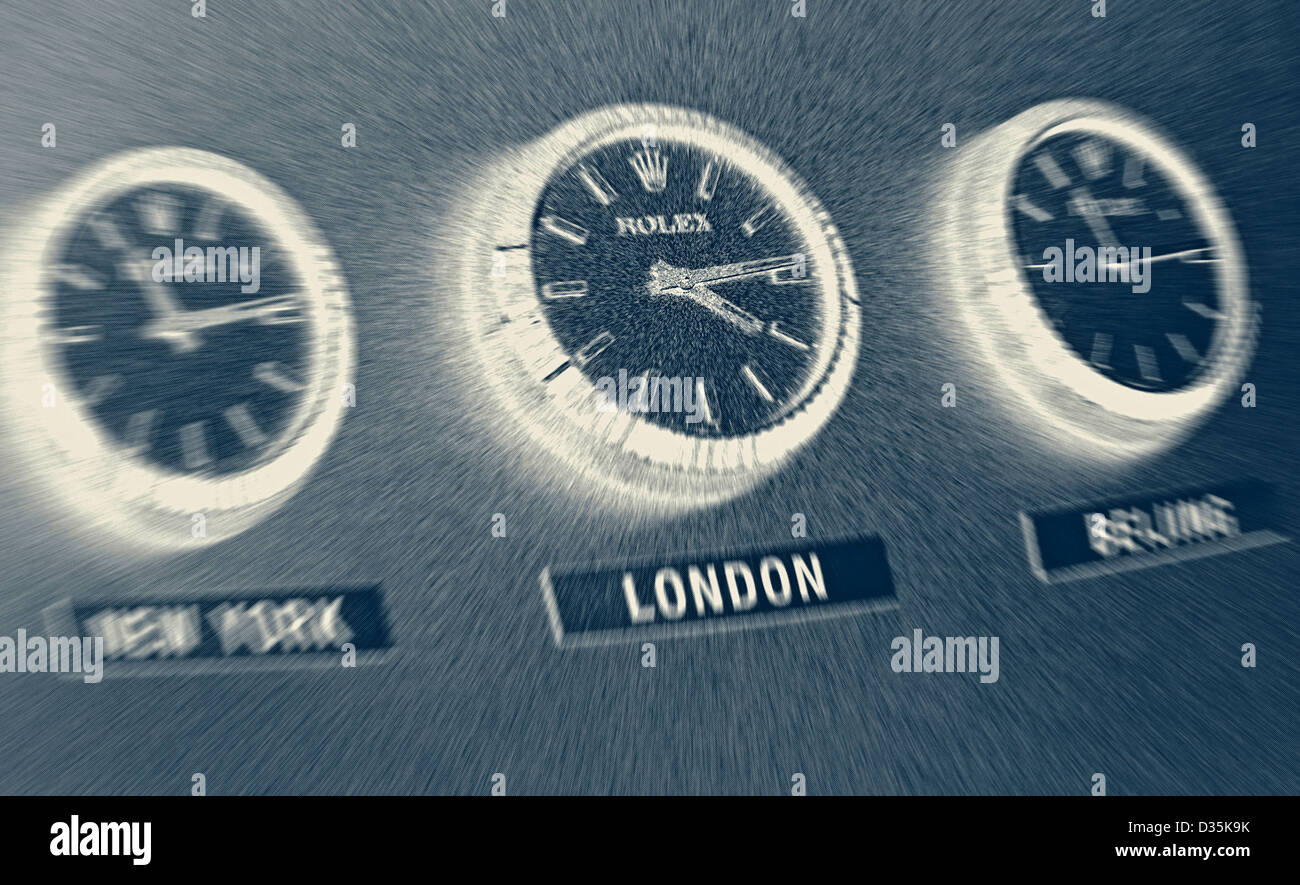 FINANCE BUSINESS TIME ZONES CONCEPT NEGATIVE Three Rolex office wall clocks with blur effect showing time zones L-R  New York, London, Beijing. Stock Photo