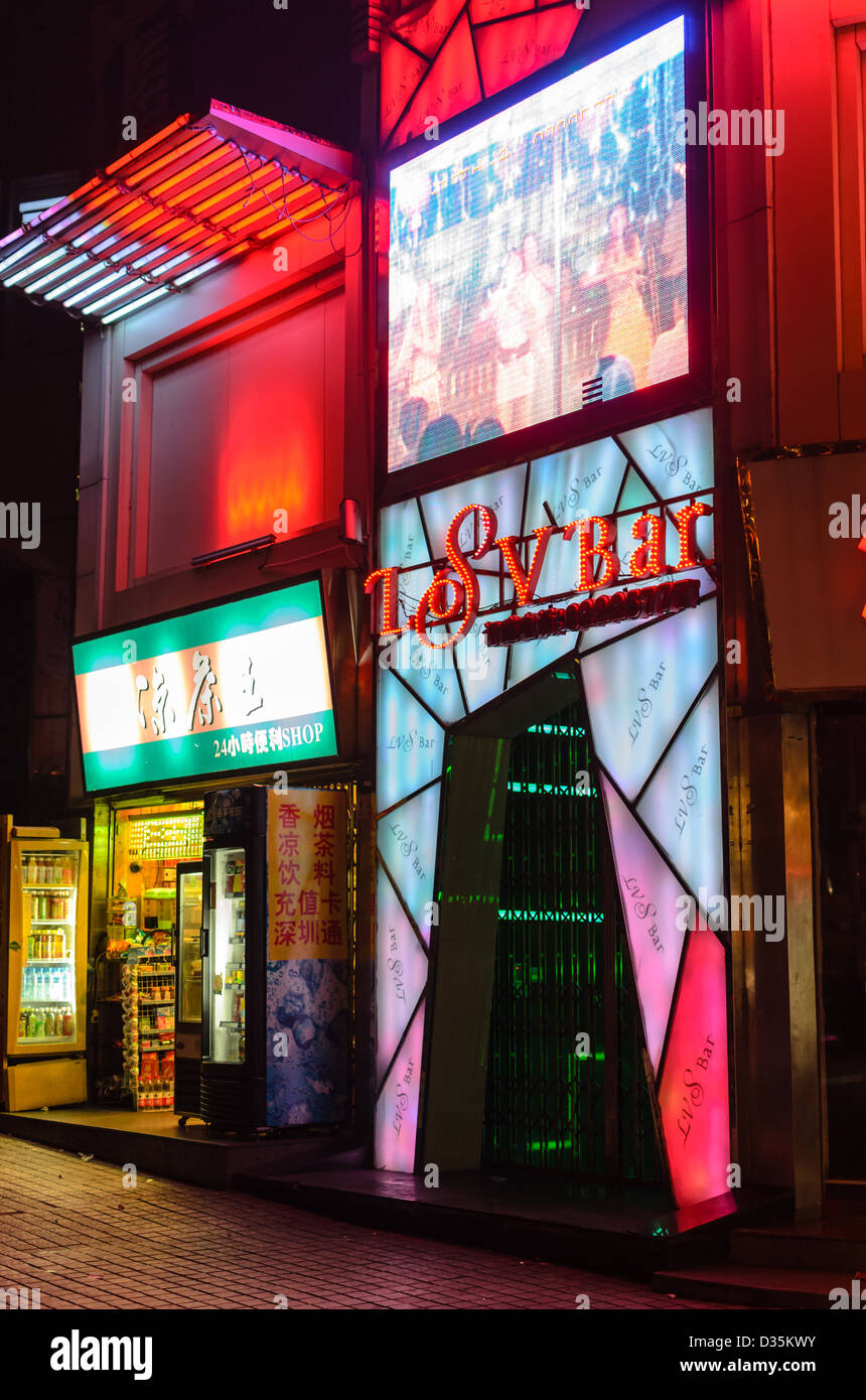 Brightly lit modern Chinese nightclub entrance, at night Stock Photo - Alamy