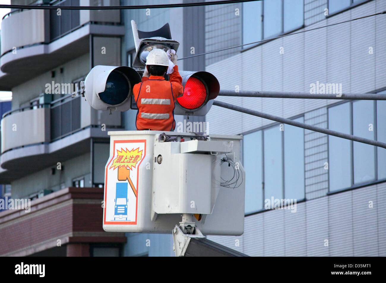 Traffic lights maintenance and cleaning in a town Tokyo Japan Stock Photo Alamy