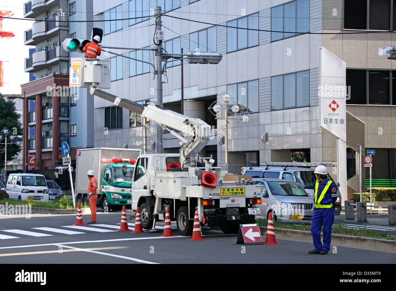 Traffic lights maintenance and cleaning in a town Tokyo Japan Stock Photo Alamy