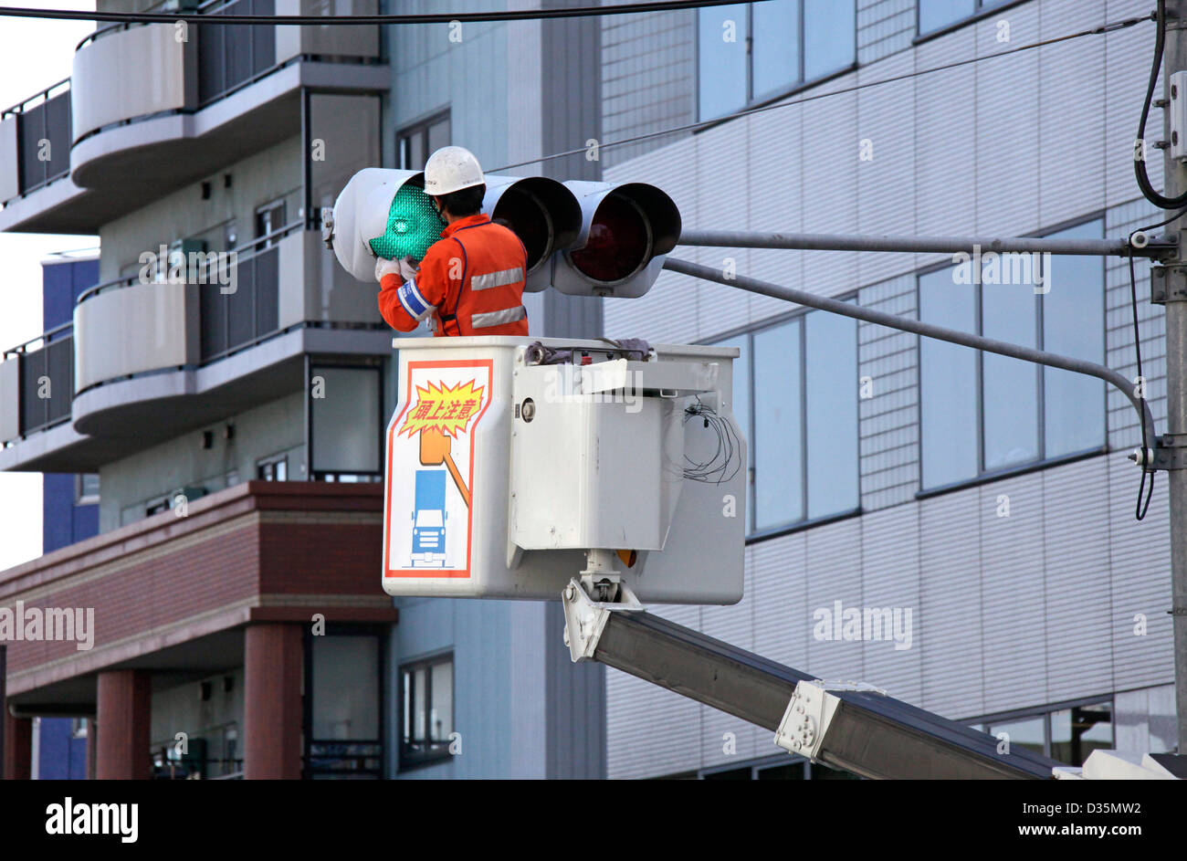 Traffic lights maintenance and cleaning in a town Tokyo Japan Stock Photo Alamy