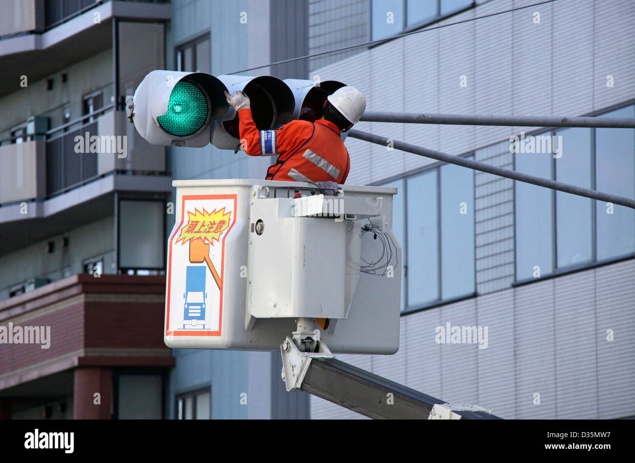 Traffic lights maintenance and cleaning in a town Tokyo Japan Stock Photo Alamy