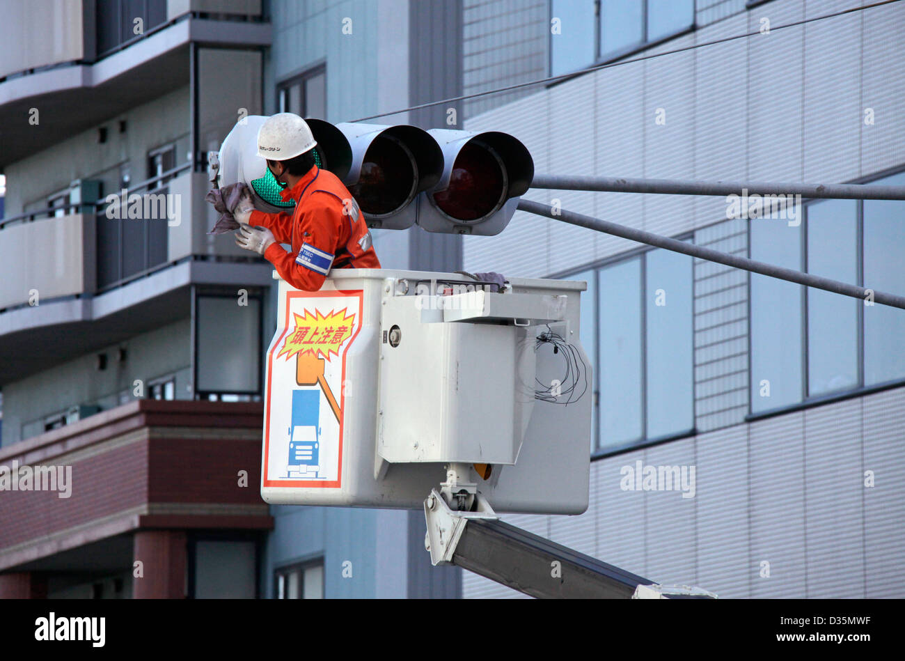 Traffic lights maintenance and cleaning in a town Tokyo Japan Stock Photo Alamy