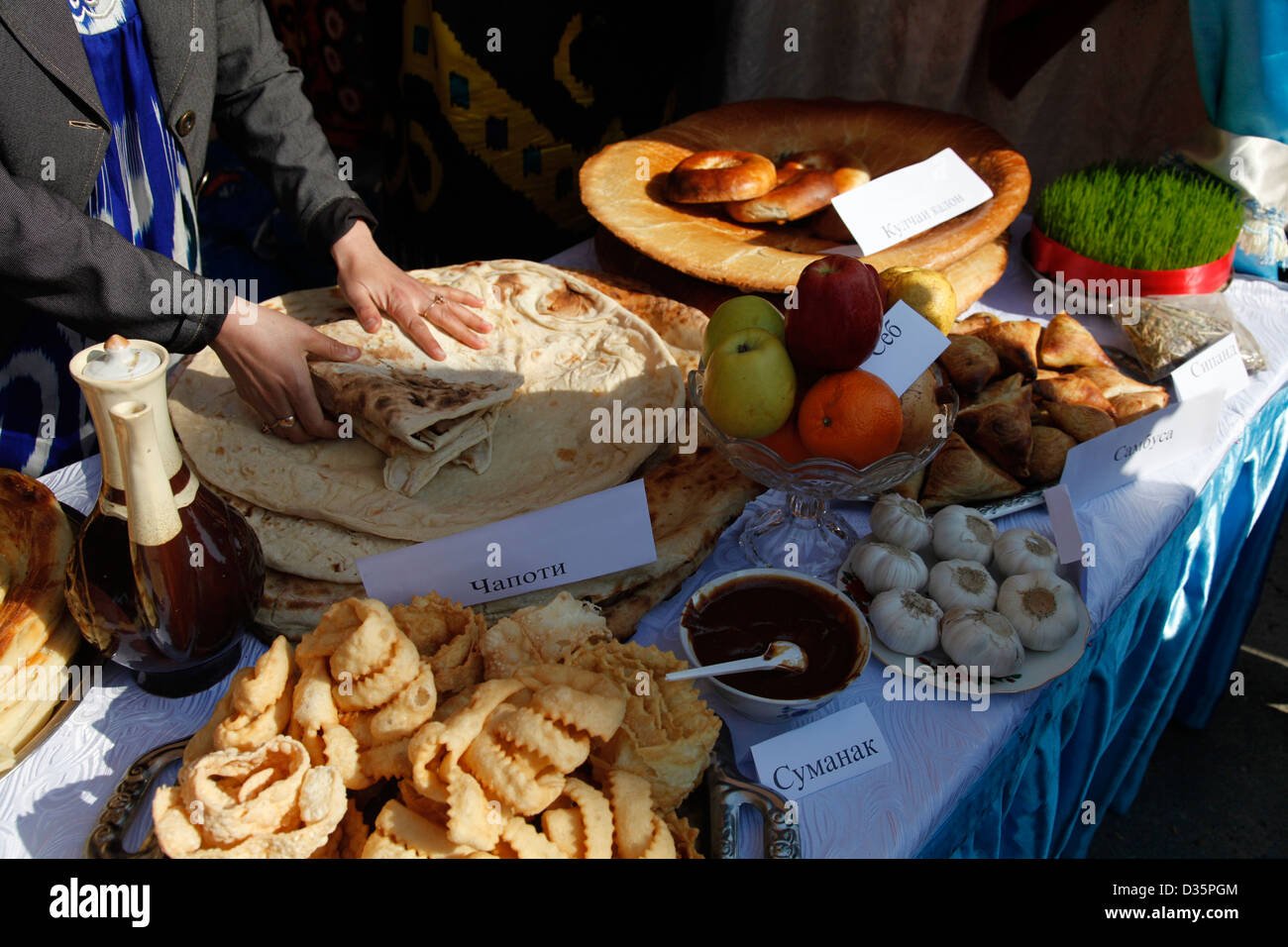 Tajik breads and produce at a Navruz spring celebration Stock Photo