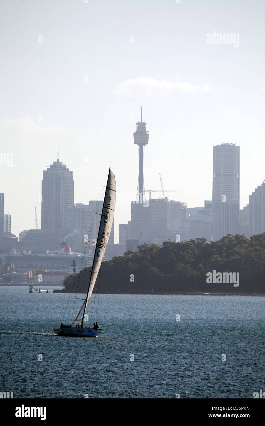 Investec Loyal a racing supermaxi yacht training on Sydney Harbour for the Sydney to Hobart yacht race. Stock Photo