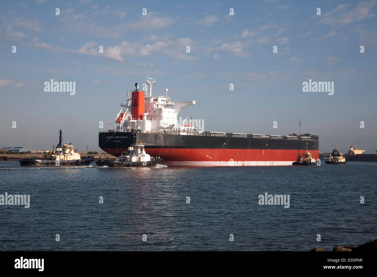 Panamax Dry Bulk Carrier MV Spring Samcheonpo being assisted to her ...