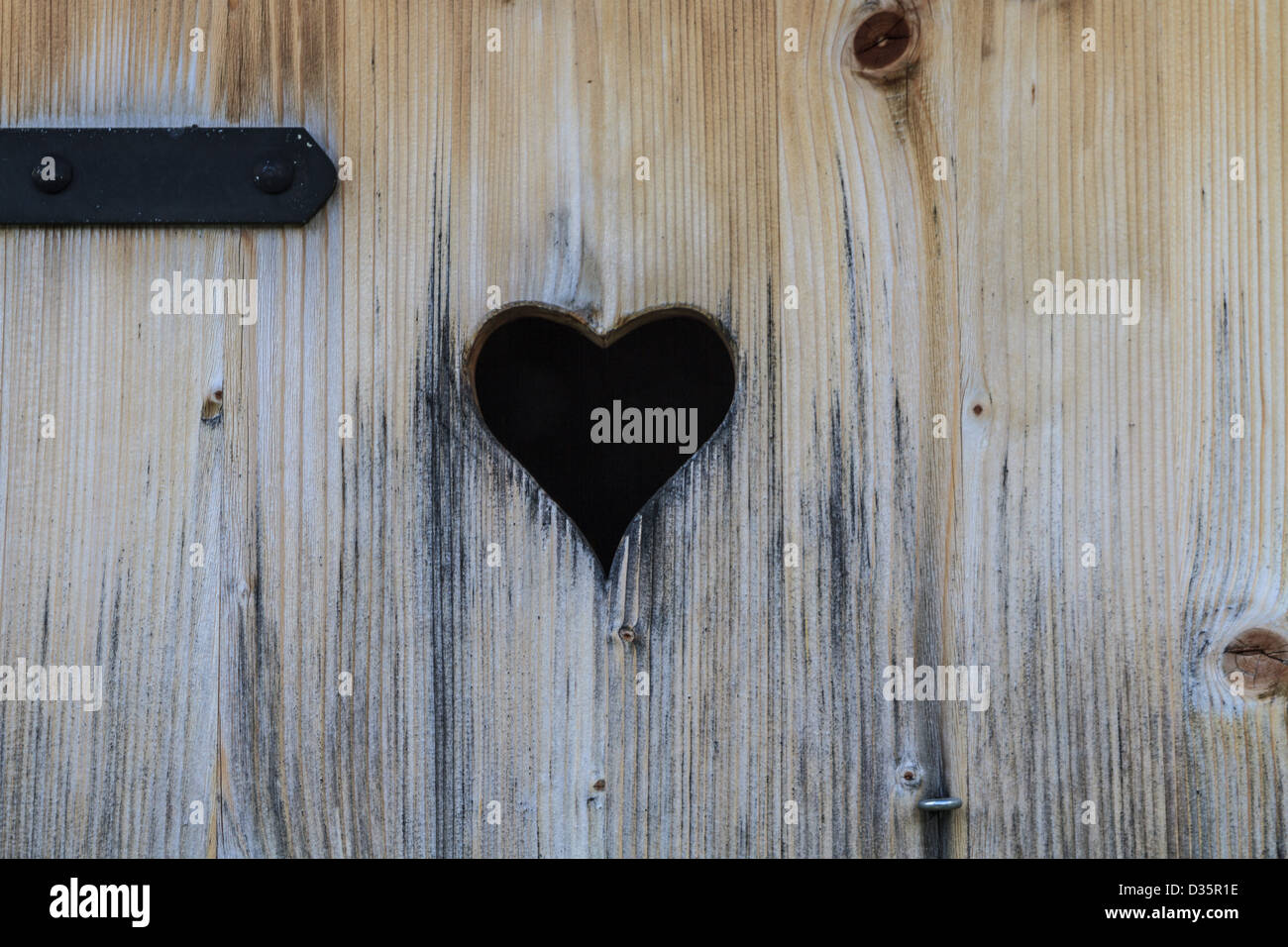 Heart in old wooden door Stock Photo