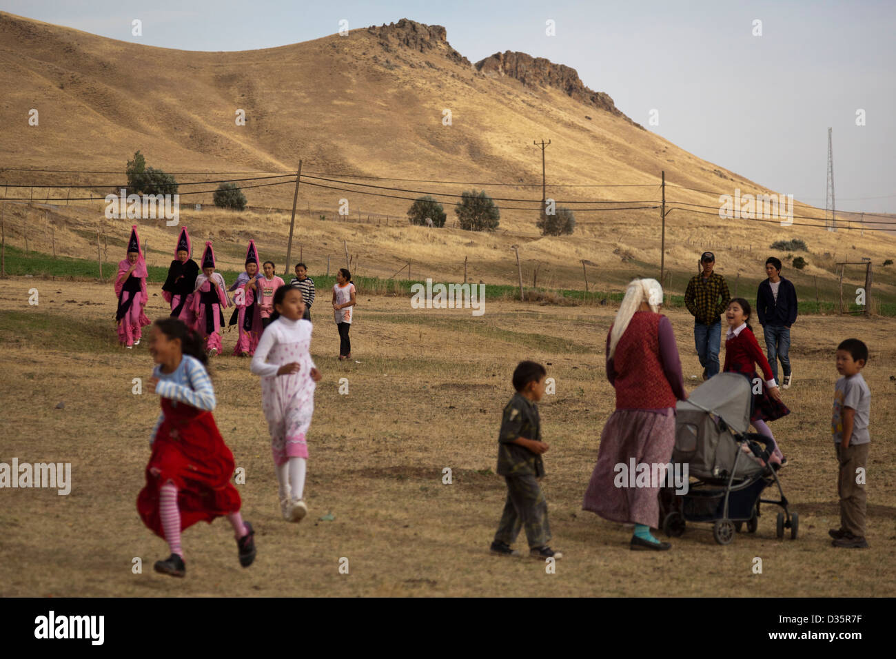 Kyrgyz children get ready for cultural performance near the resettlement village of Ulupamir, eastern Turkey Stock Photo