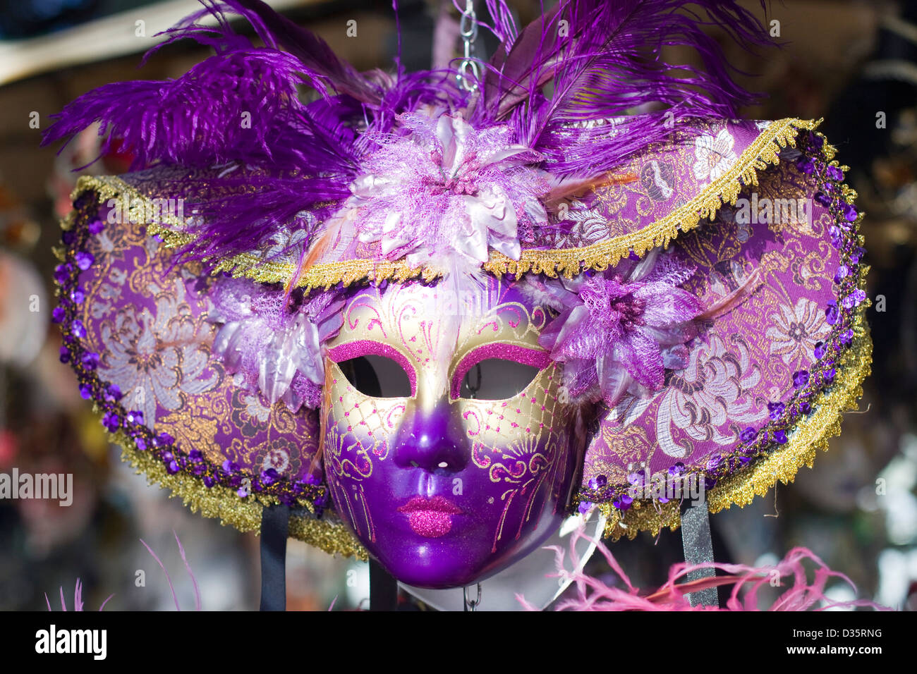 Lady in a Traditional Venetian Bauta carnival Mask and costume for the annual Venice Carnival Italy Stock Photo