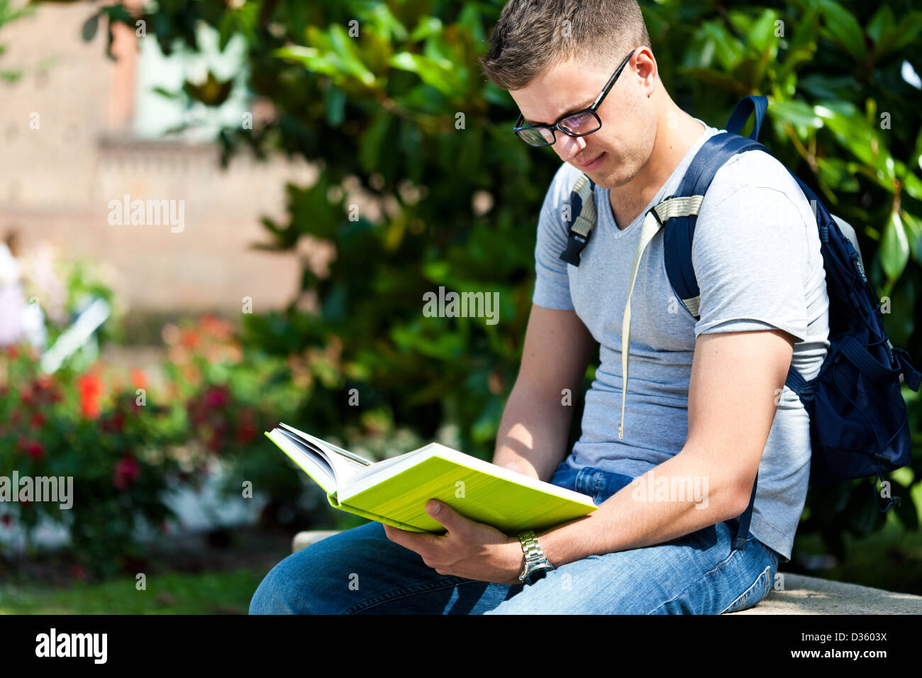 Outdoor portrait of a smiling student Stock Photo - Alamy
