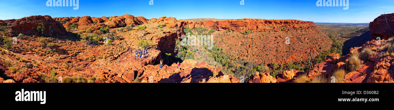 Tourist admire the view from one of the lookouts on t he hiking trail at Kings Canyon Central Australia Northern Territory Stock Photo