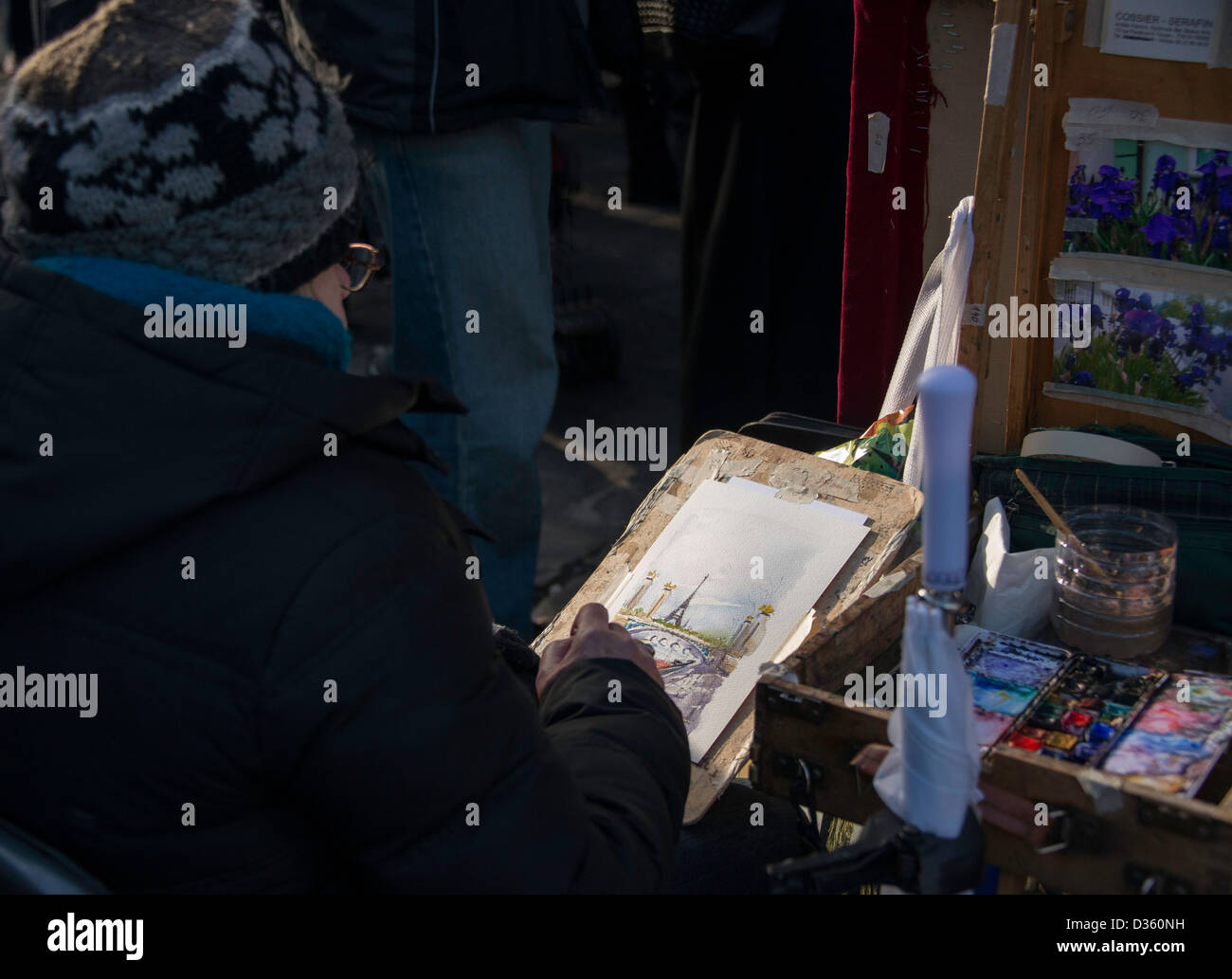 Artist bundled up against the cold, Montmartre, Paris, France Stock Photo