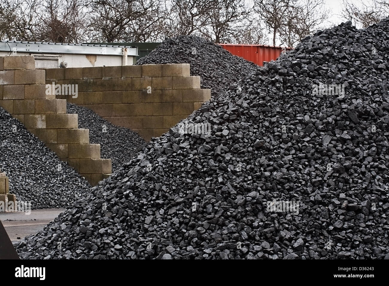 Coal yard with supply in heaps for domestic use Stock Photo