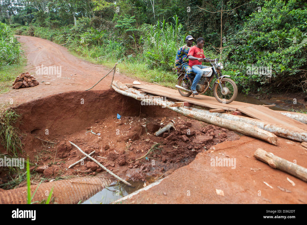 CAMEROON, 2nd October 2012: Logging trails and small roads are often washed out by heavy rains if not carefully maintained. Stock Photo