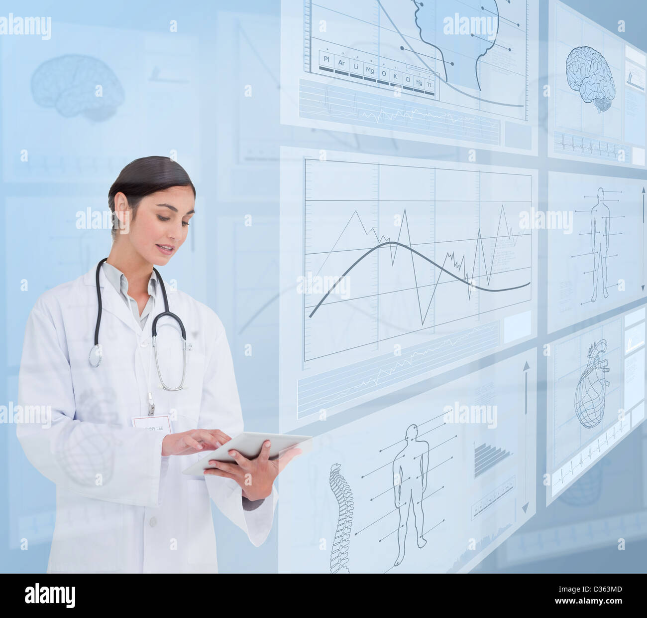 Woman doctor using a tablet pc Stock Photo