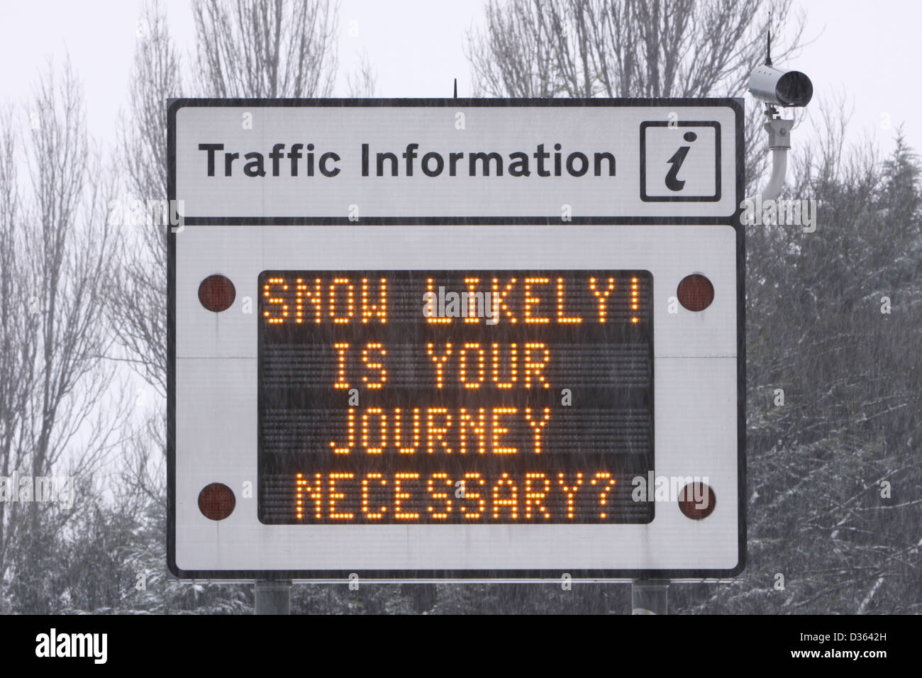 A road sign warning of snow Stock Photo - Alamy