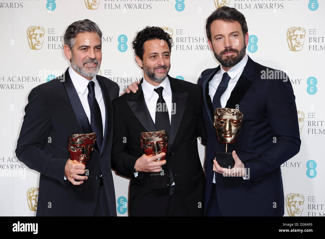 London, UK. Feb 10th, 2013. Best Film winners George Clooney, Grant Heslov and Ben Affleck pose in the Press Room at the EE British Academy Film Awards at The Royal Opera House on February 10, 2013 in London, England. Credit: London Entertainment/Alamy Live News Stock Photo