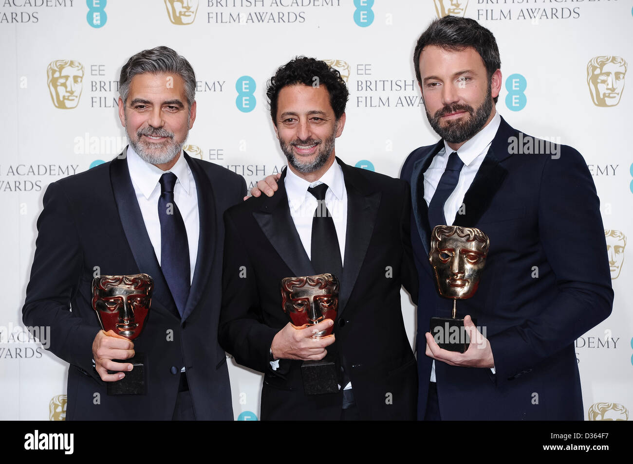 London, UK. Feb 10th, 2013. Best Film winners George Clooney, Grant Heslov and Ben Affleck pose in the Press Room at the EE British Academy Film Awards at The Royal Opera House on February 10, 2013 in London, England. Credit: London Entertainment/Alamy Live News Stock Photo