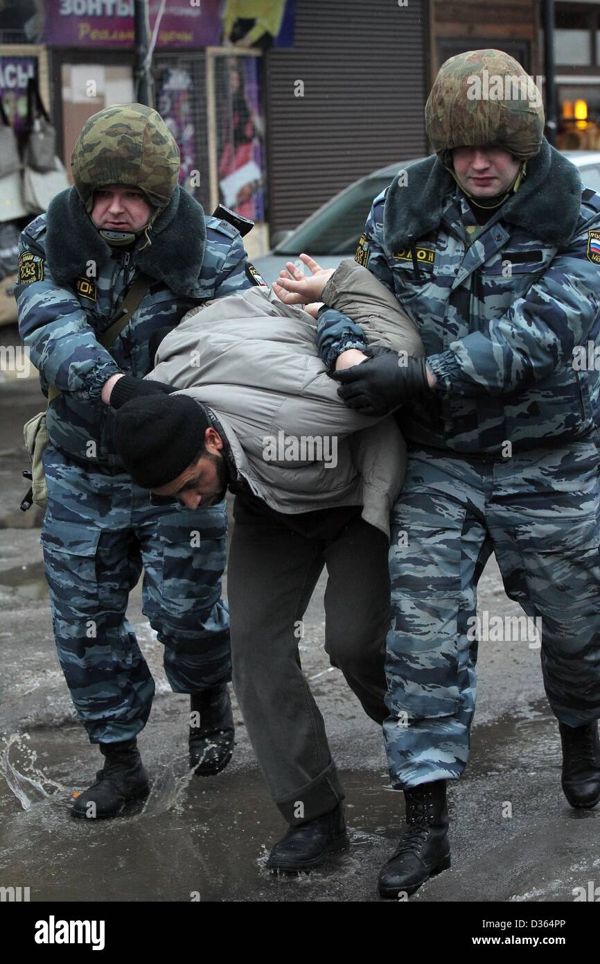 St.Petersburg, Russia. 8th Feb, 2013.  Russian police conducted a special operation in Apraksin Dvor market of St.Petersburg and have detained 271 people, most of them from the North Caucasus and central Asia, in an investigation into involvement in Ã¢â‚¬Å“terrorist activitiesÃ¢â‚¬Â...Pictured: police arrest a dealer from Apraksin Dvor market. (Credit Image: Â© PhotoXpress/ZUMAPRESS.com) Stock Photo