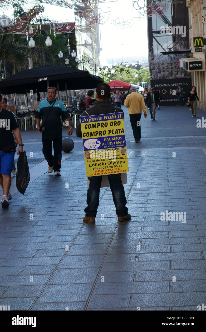 Sandwich board man advertises gold and silver buying shop, Tenerife, Spain  Stock Photo - Alamy