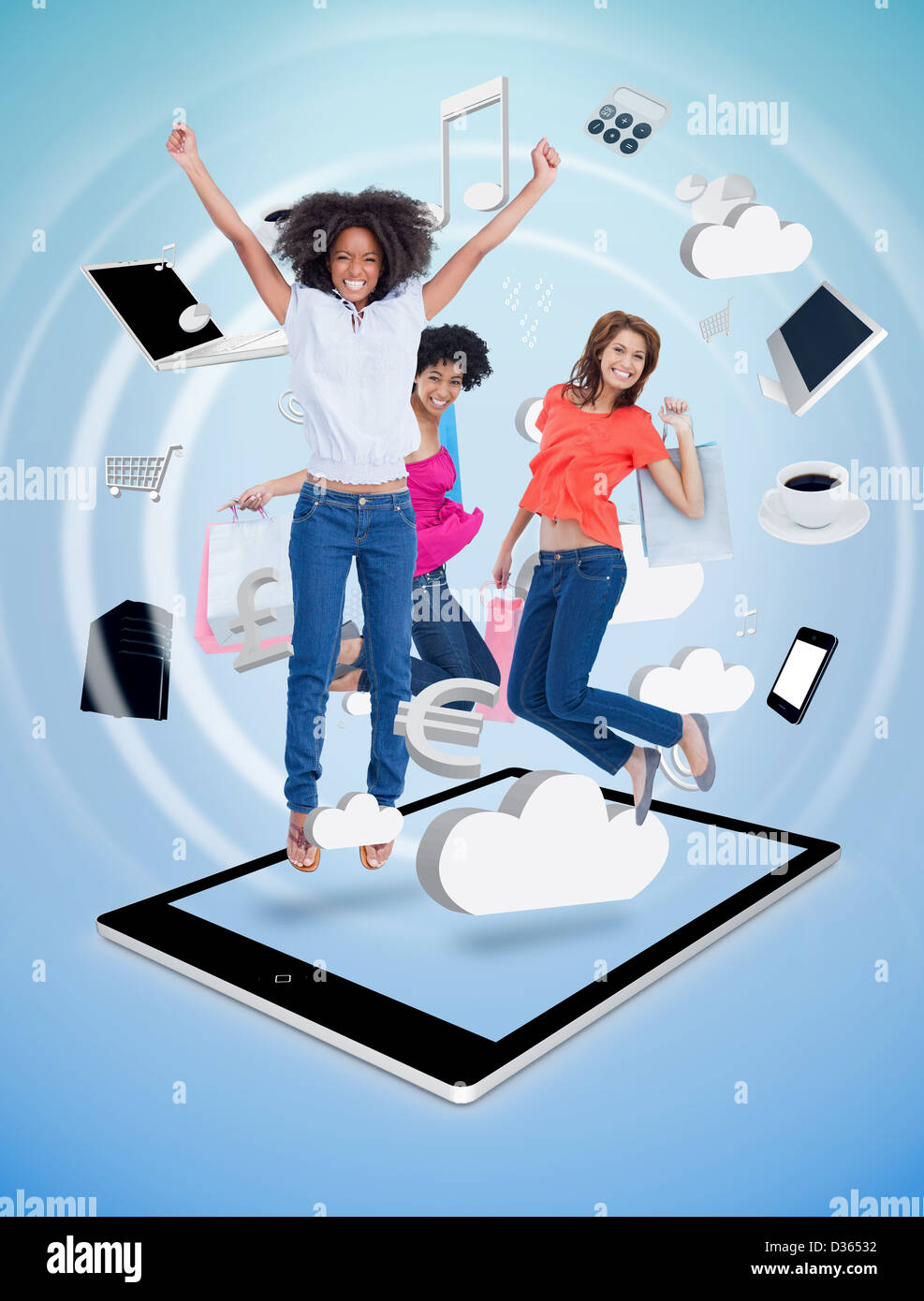 Three cute women jumping on a tablet pc Stock Photo