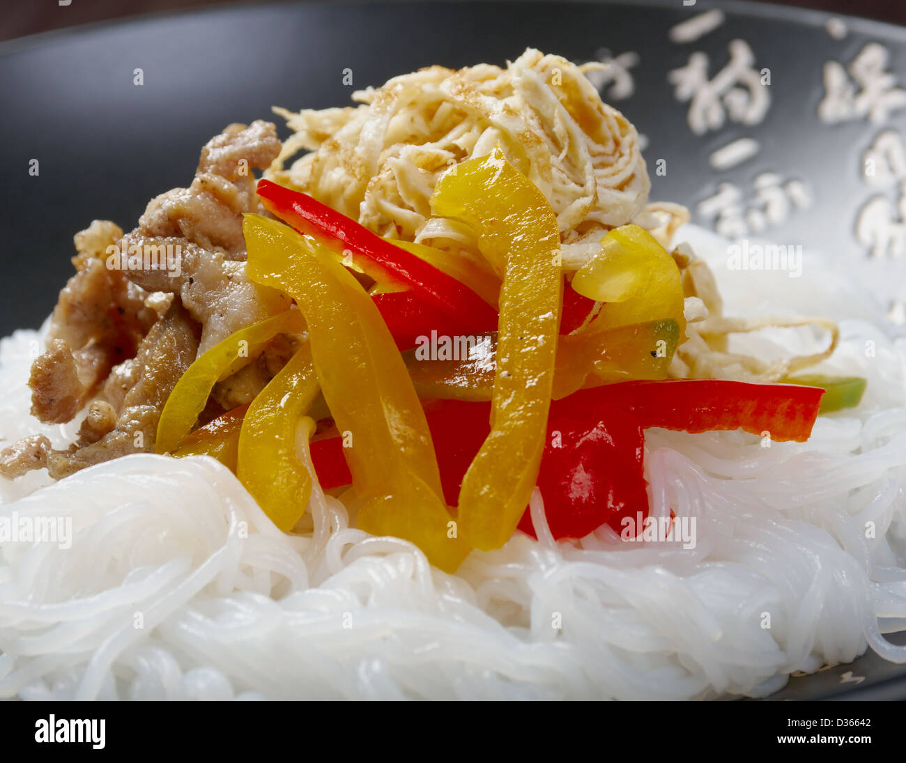 Chinese rice noodles with pork Stock Photo Alamy