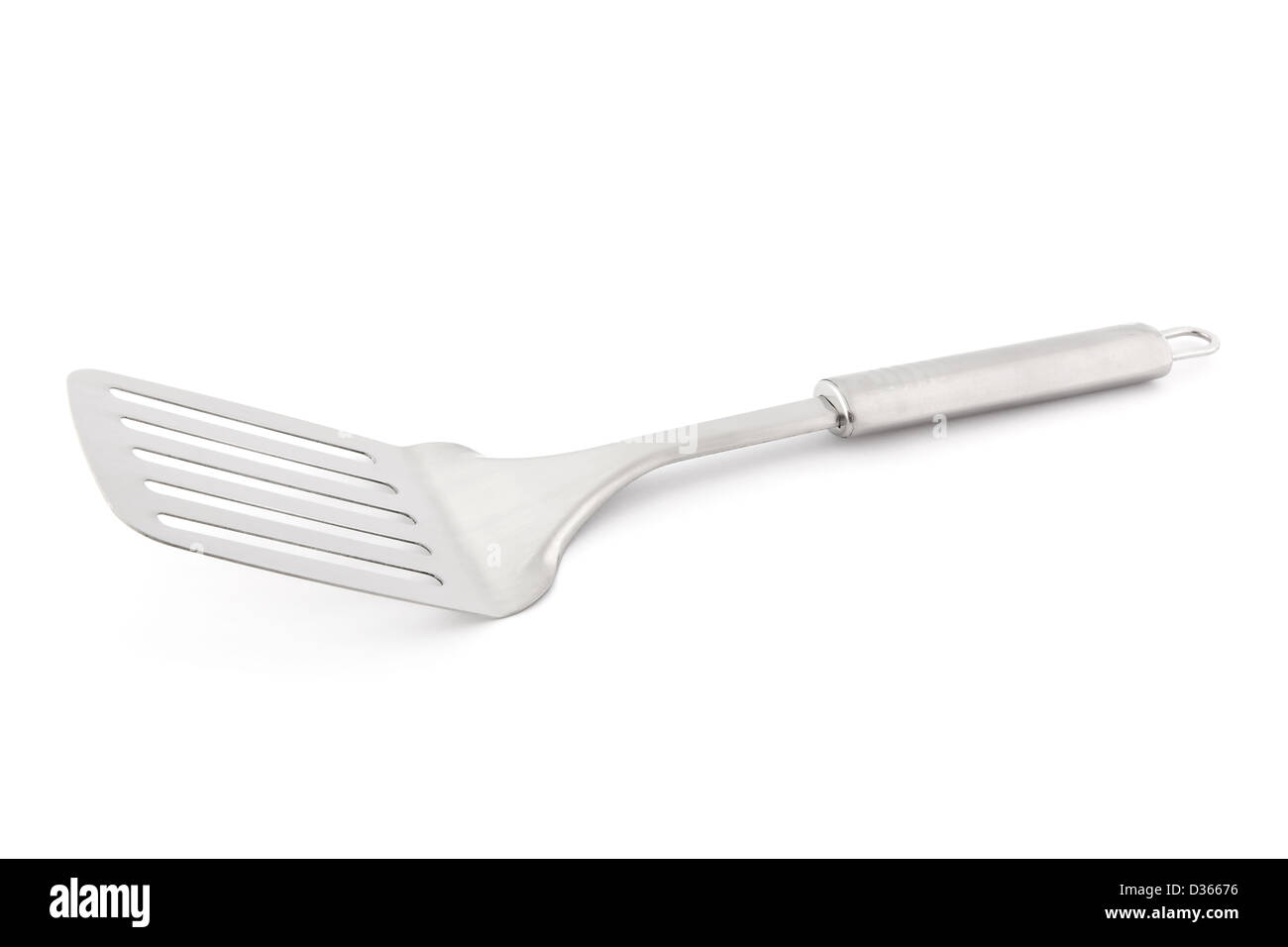 Single silver spatula on a white background Stock Photo