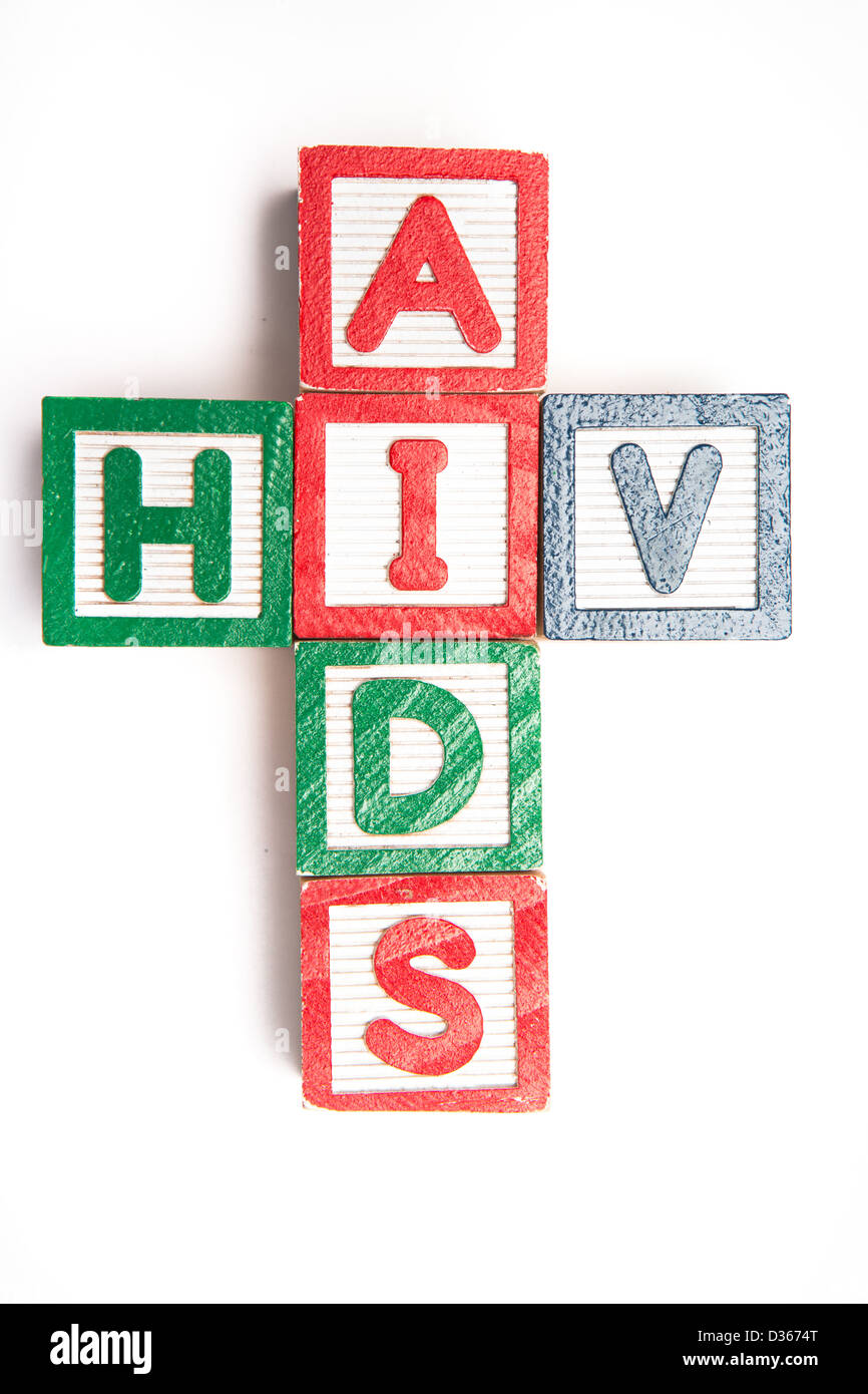 Wood blocks spelling aids and hiv in a cross shape Stock Photo