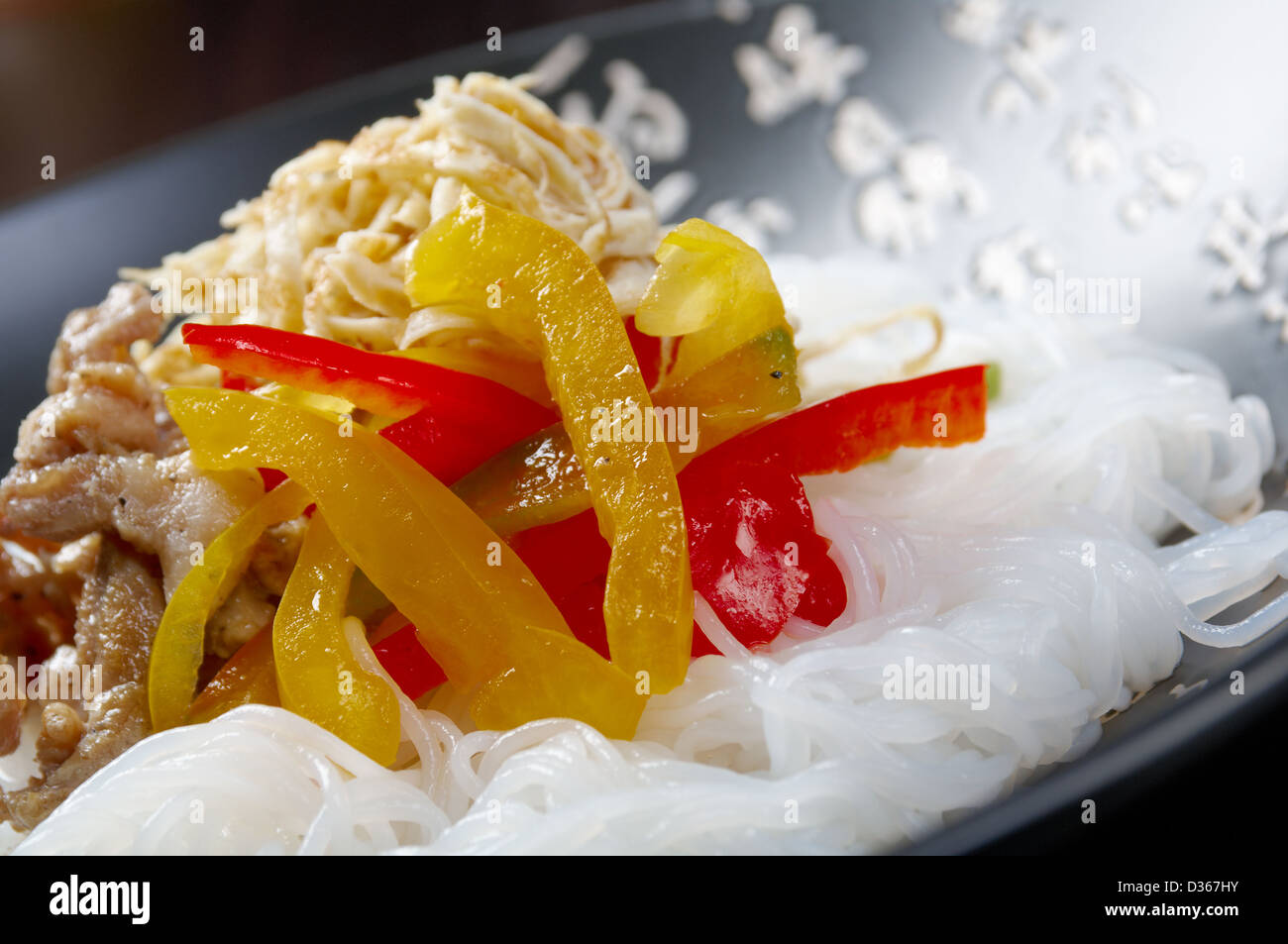 Chinese rice noodles with pork Stock Photo - Alamy
