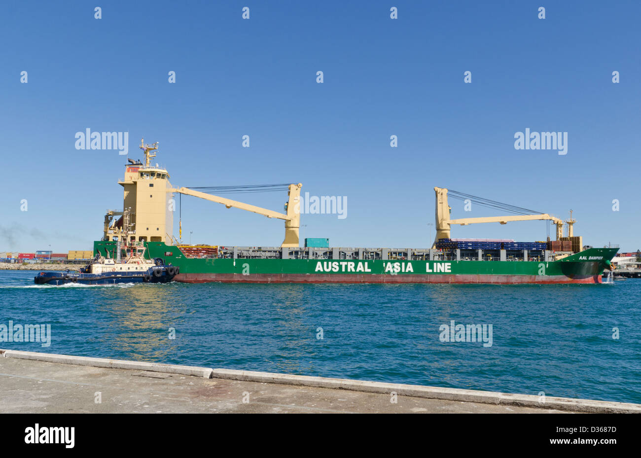 The MultiPurpose HeavyLift Ship AAL Dampier, is assisted into the inner harbour at the Port of