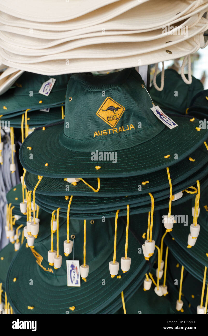 Australian hats with corks hanging off at a tourist shop souvenir stand, Australia Stock Photo