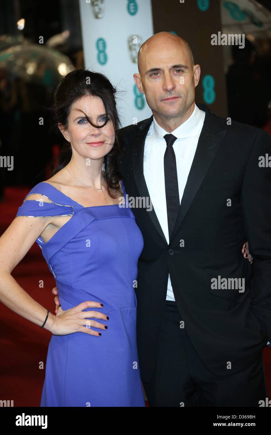 Actor Mark Strong and tv producer Liza Marshall arrive at the EE British Academy Film Awards at The Royal Opera House in London, England, on 10 February 2013. Photo: Hubert Boesl Stock Photo
