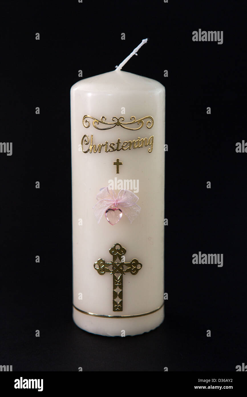 White christening candle with pink detail Stock Photo Alamy