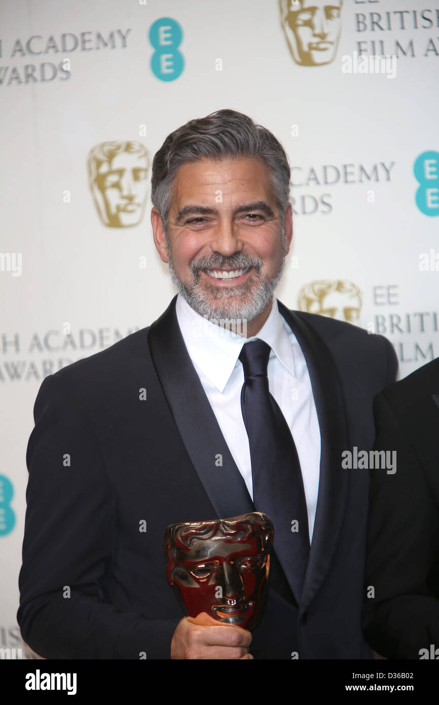 Producer and actor George Clooney poses in the press room of the EE British Academy Film Awards at The Royal Opera House in London, England, on 10 February 2013. Photo: Hubert Boesl Stock Photo