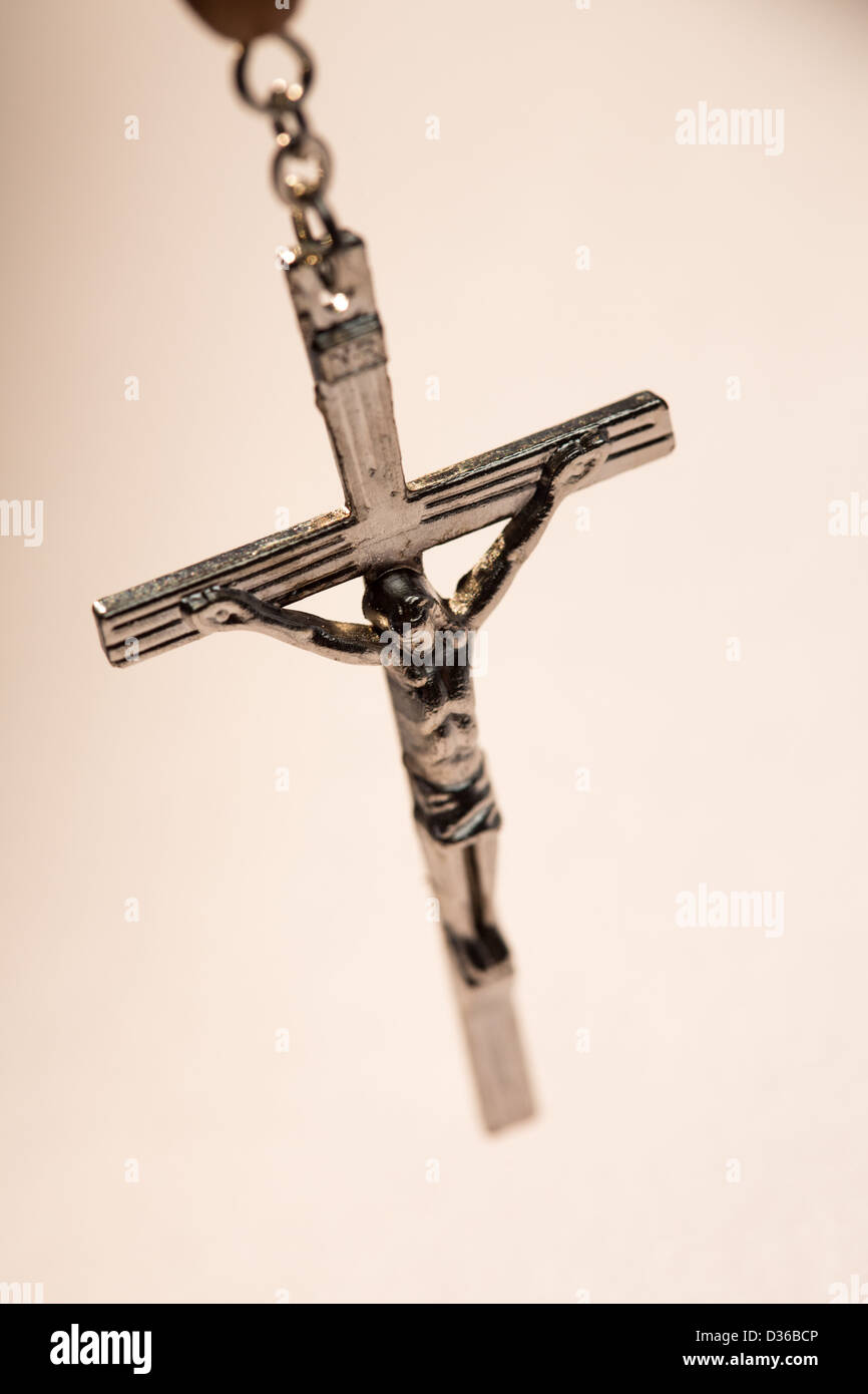 Close up of crucifix of rosary beads Stock Photo