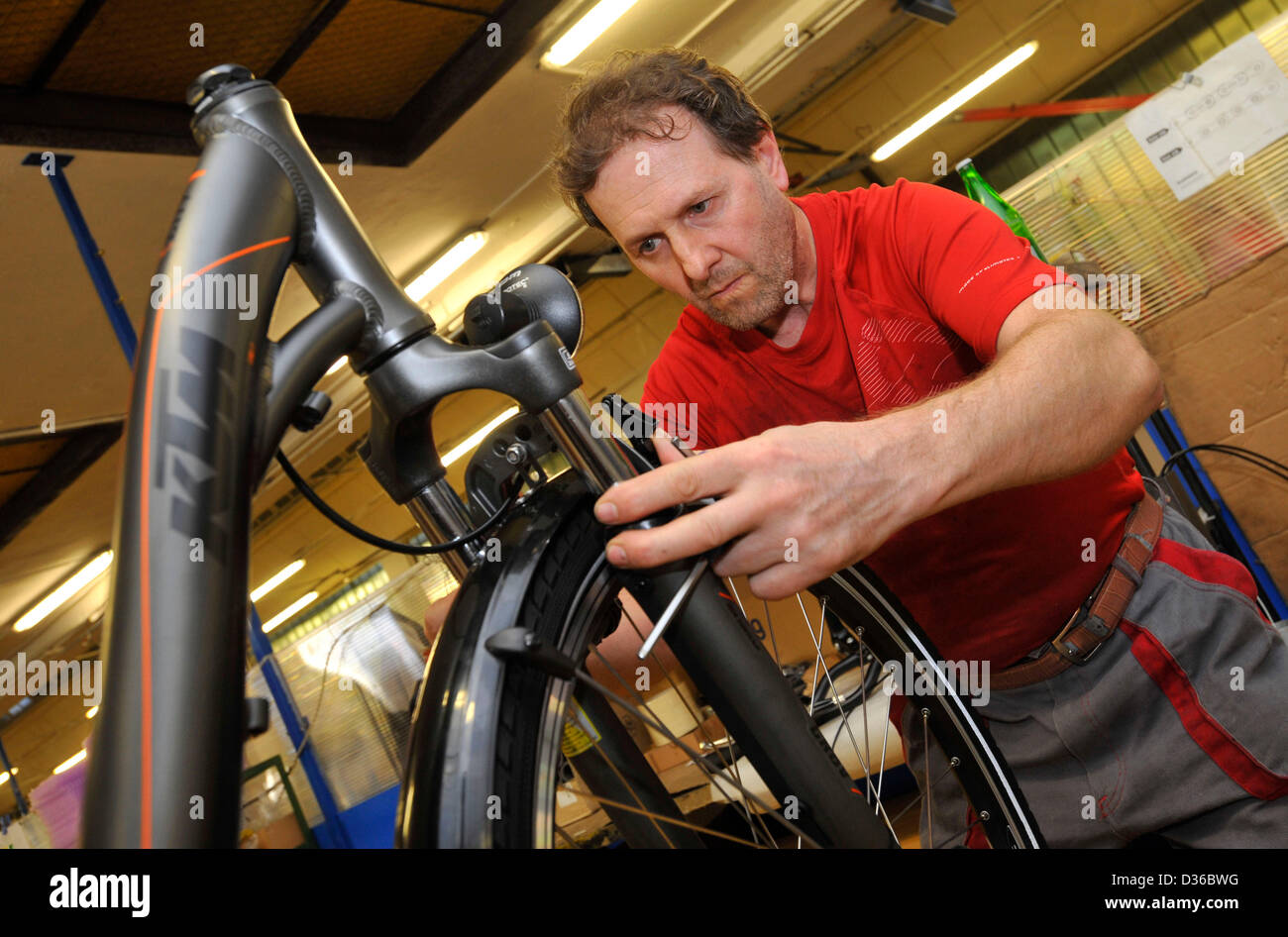 Worker of BPS Bicycle Industrial Company is seen during the production of 2800 bicycles and electric bikes for the Swiss Army. (CTK Photo/Ludek Perina) Stock Photo