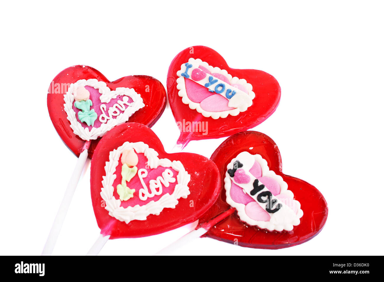 Red heart shape lollipops isolated on white background Stock Photo - Alamy