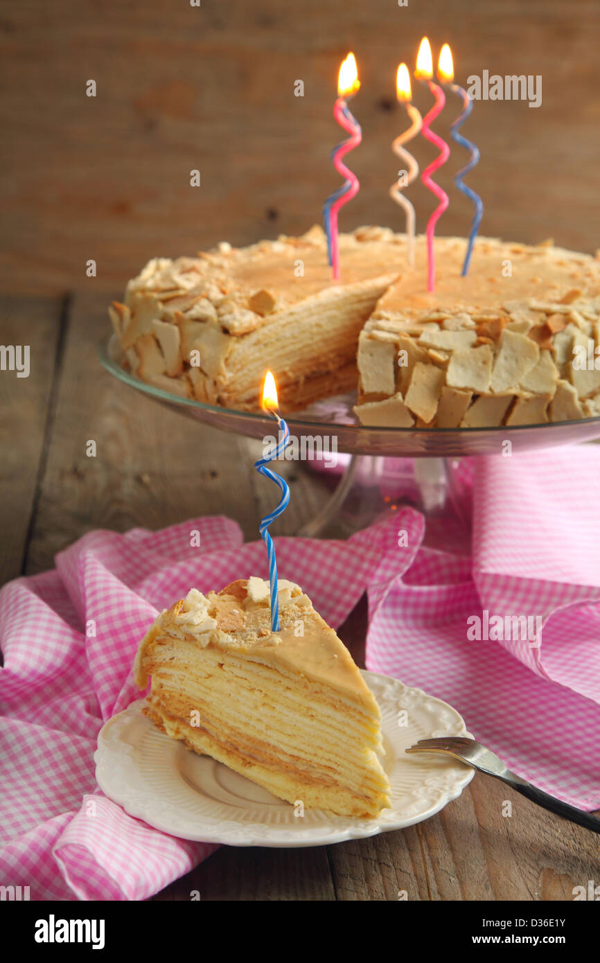 Cake Napoleon of puff pastry with cream for birthday Stock Photo