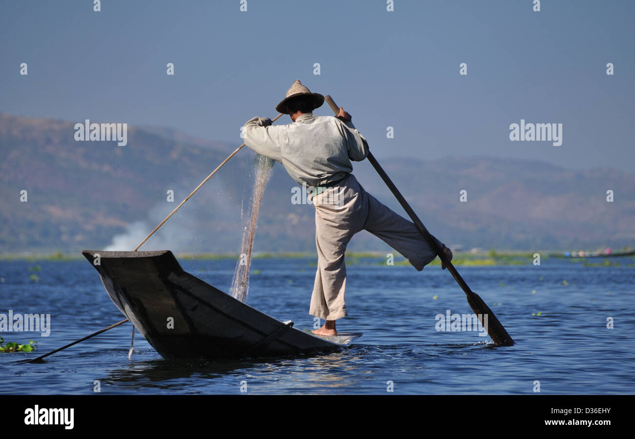 Fishing nets and leg rowing inle lake hi-res stock photography and images -  Alamy
