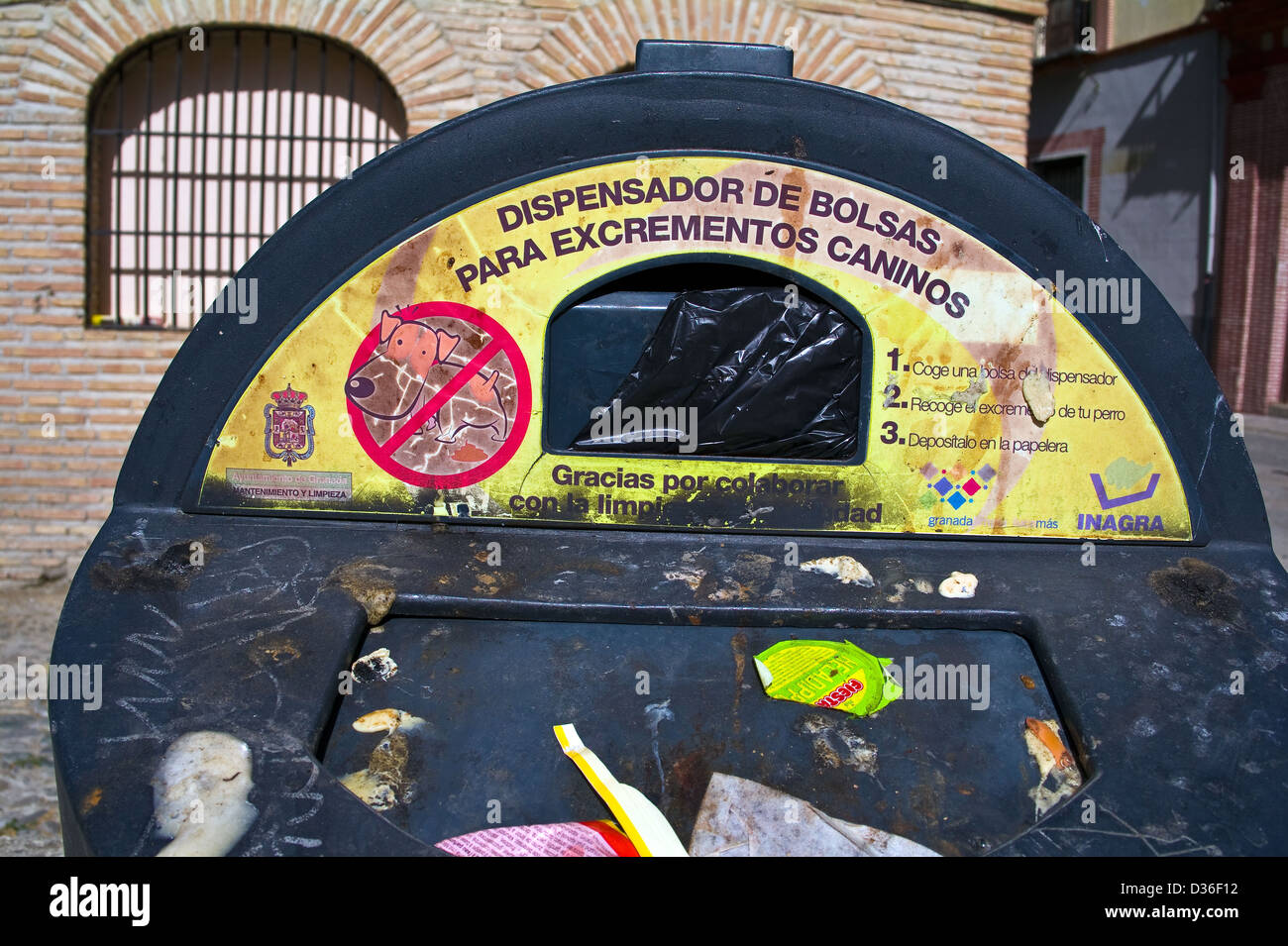 A dispenser of bags for dog waste in Granada, Andalucia, Spain Stock Photo