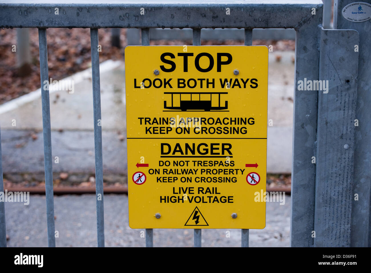 Danger Sign on the Volks Railway along Brighton seafront UK Stock Photo